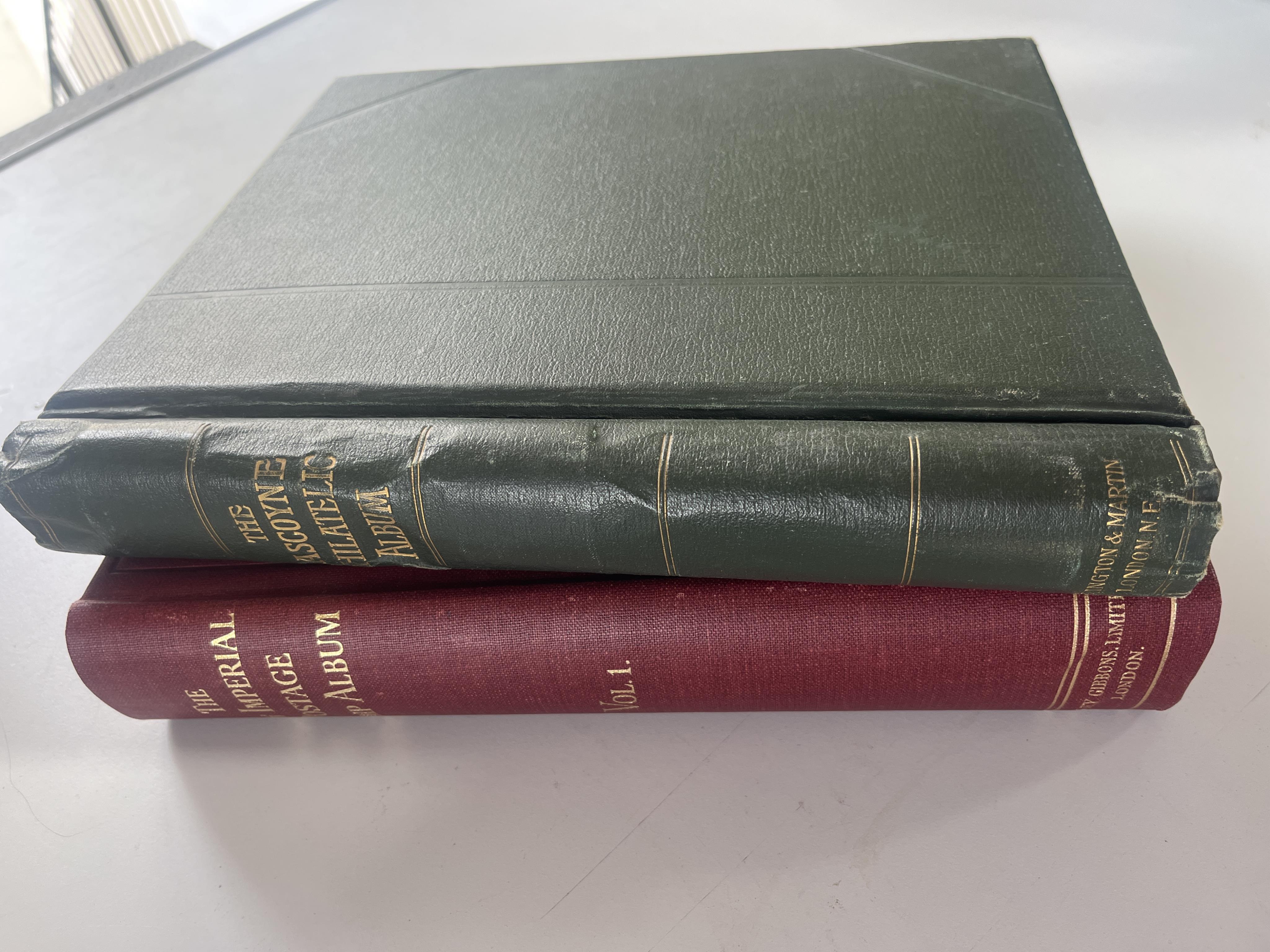 New Imperial postage stamp album and The Gascoyne Philatelic album containing 1d black, 1d reds 1d blue, Trinidad five shillings and another with Victorian 2/6d Victoria to George VI British & Commonwealth stamps etc (2